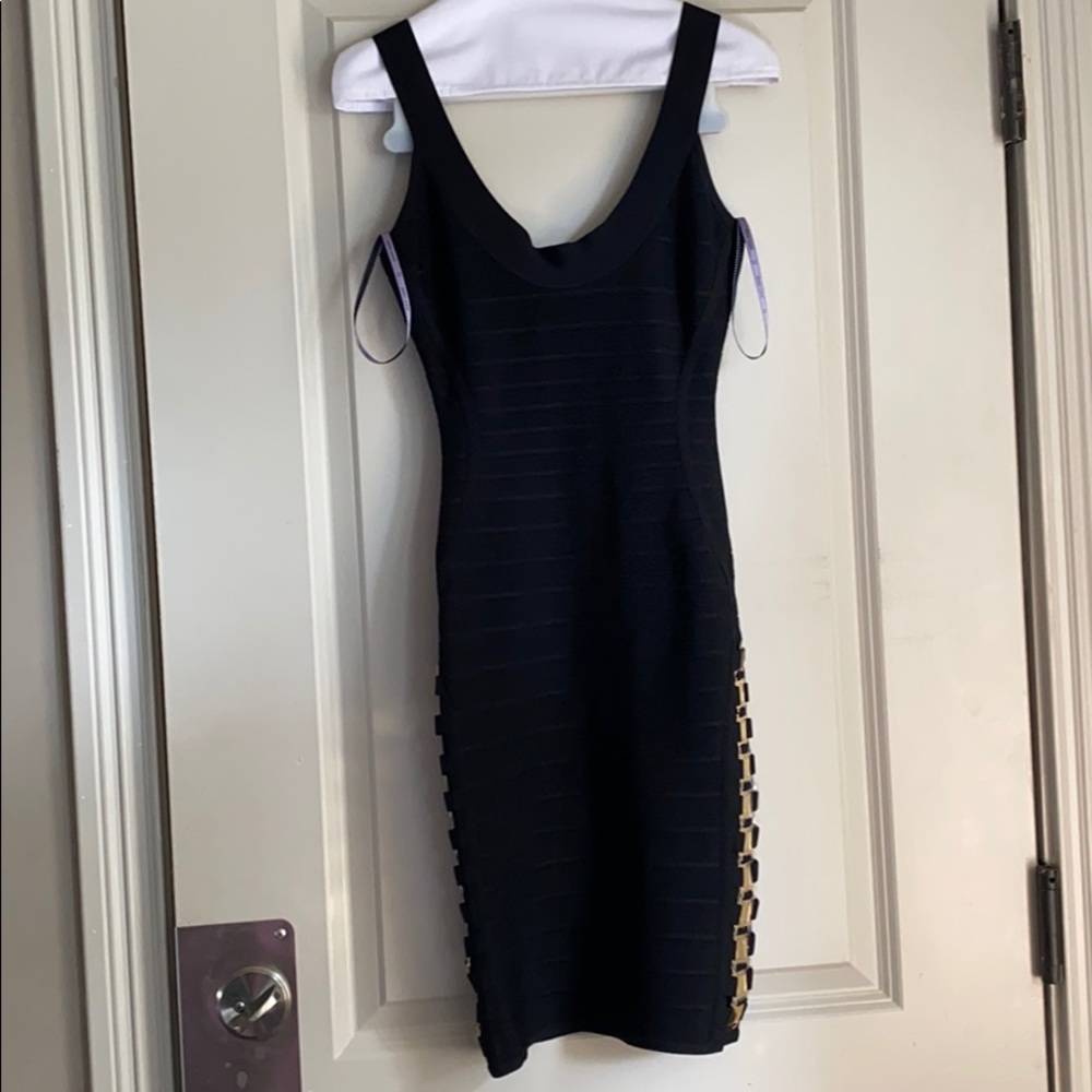 Herve Leger black dress with gold accents